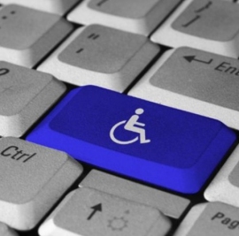 lavoro disabili: tasto tastiera pc con immagine carrozzina 